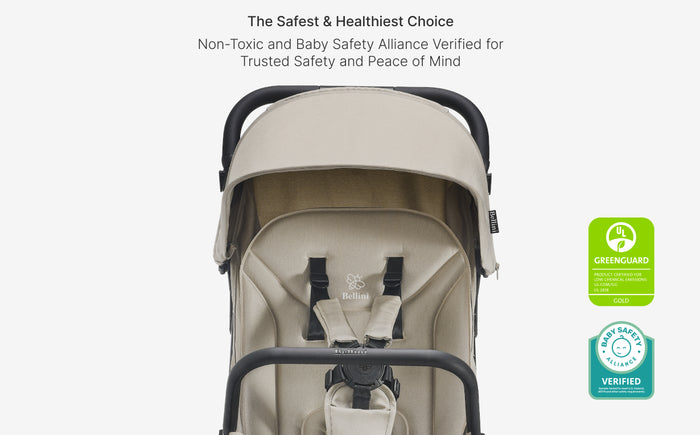 Beige baby stroller with safety certification logos on a white background