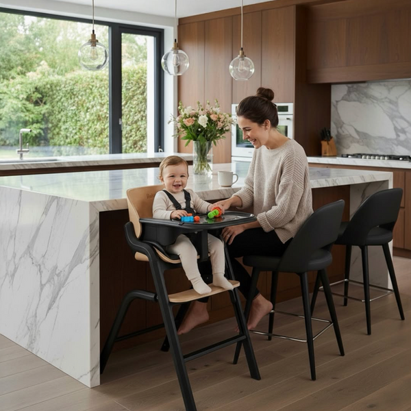 Woman and child in a high chair in a modern kitchen